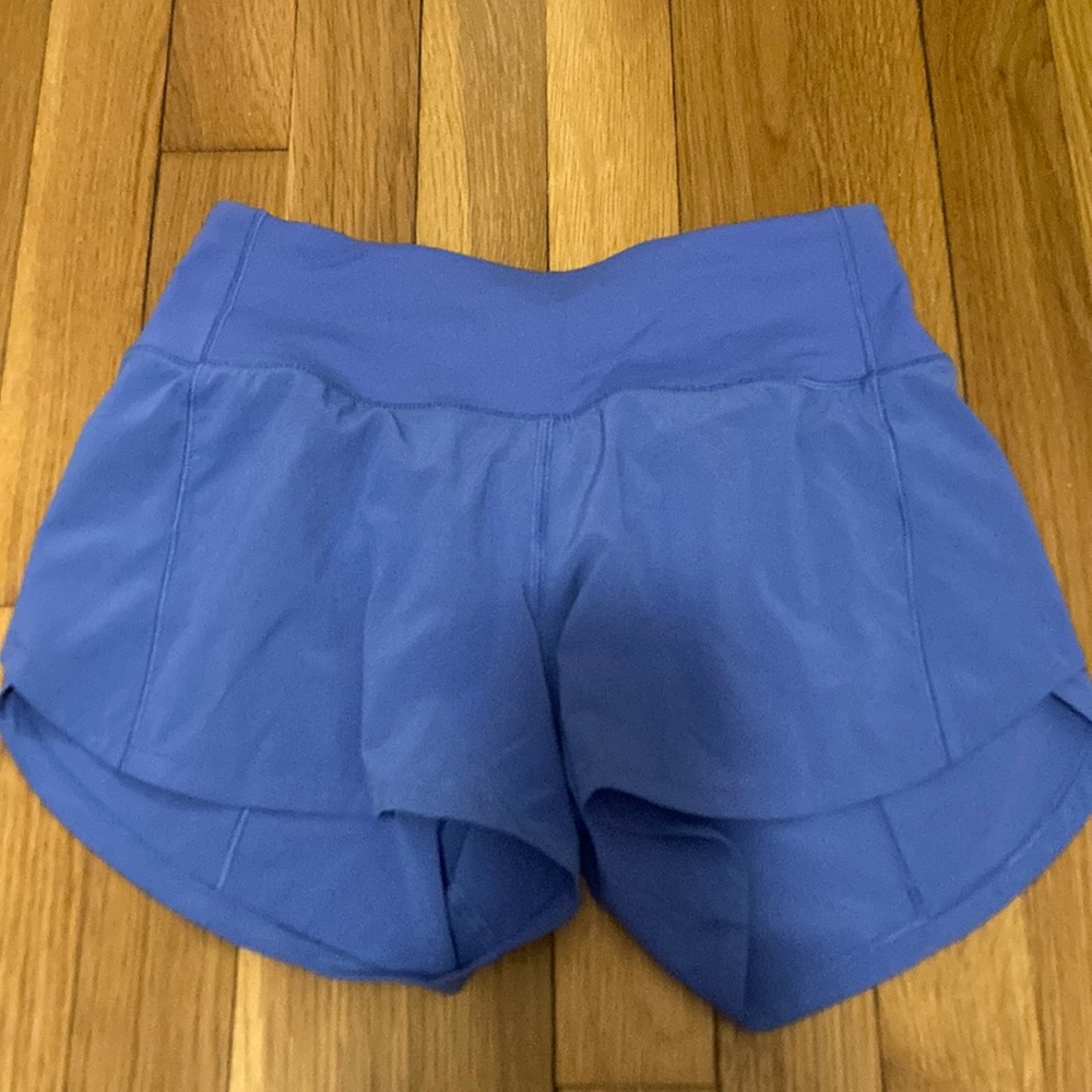 NEVER WORN wild indigo Lululemon speed up Mid rise 4” size 0